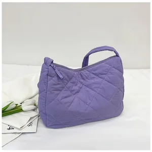 Purple quilted nylon shoulder bag detail, casual daily tote handbag with secure zipper.