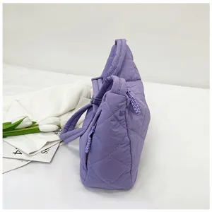 Detailed view of purple quilted nylon tote bag, casual large capacity shoulder handbag.