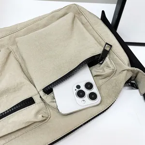 Nylon multi-pocket shoulder crossbody bag detail view, casual style with handy zipper.