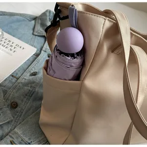 Beige nylon tote bag with purple capsule umbrella, large capacity casual shoulder bag.