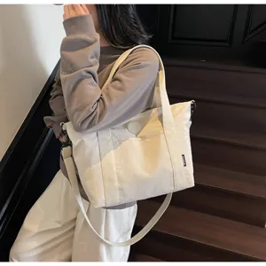 Grote casual effen canvas tote tas, veelzijdige schouder- en crossbodytas voor dames en heren.