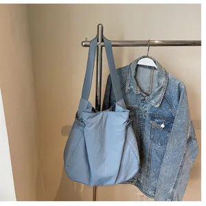 Lightweight nylon shoulder bag for women, simple casual daily commuter tote and handbag.