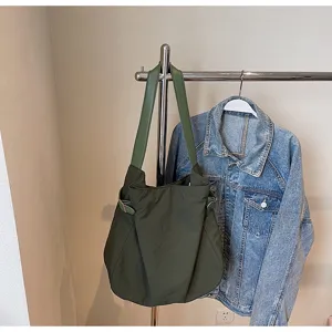 Green nylon shoulder bag for women, casual lightweight tote bag for daily commute and work.