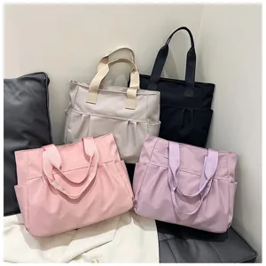 Large capacity nylon tote bag for women, minimalist casual shoulder bag, daily commuting handbag.