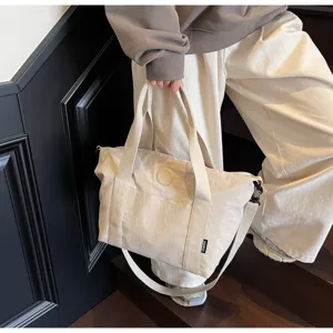 Grote capaciteit effen canvas tote bag stijlvolle casual schoudertas voor dagelijks gebruik.