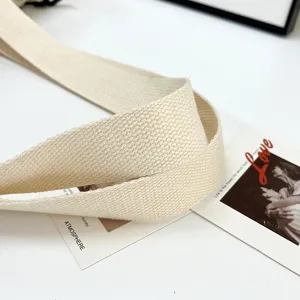 Detailed view of the durable canvas shoulder strap for the stylish casual corduroy tote bag.