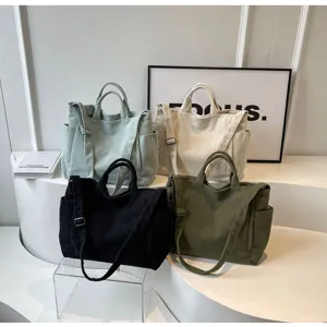 Large capacity corduroy tote bag, versatile shoulder handbag and casual commuting messenger bag.