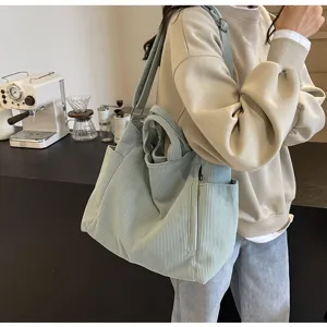 Large capacity corduroy tote bag casual shoulder bag for daily commuting and school use.