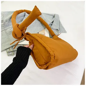 Stylish quilted shoulder bag with knotted handle, soft casual puffy handbag for women daily use.