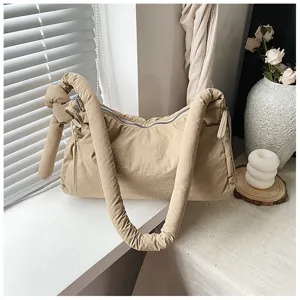 Khaki padded shoulder bag with knotted strap, soft tote crossbody bag for women daily commuting.