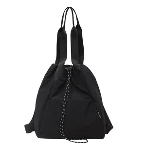 Versatile black multi-functional bucket backpack for women, large capacity casual shoulder bag.
