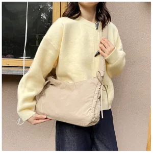 Padded crossbody shoulder bag with cute side drawstrings, soft daily commuter bag in khaki.