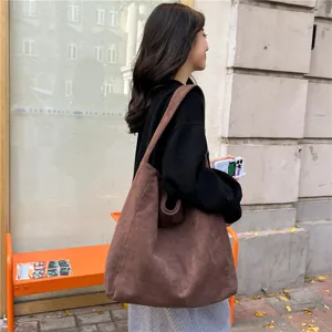 Vintage brown suede tote bag for women, large capacity casual shoulder bag, stylish commute handbag.