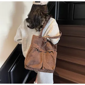 Casual corduroy tote bag for women, large capacity shoulder bag for daily commuting.