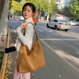Stylish retro suede tote bag for women, casual large capacity shoulder bag for daily commuting.