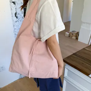 Korean style casual pink canvas shoulder tote bag for women, large capacity minimalist purse.