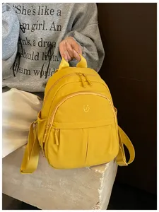Casual yellow nylon mini backpack for women, lightweight everyday casual daypack for school.