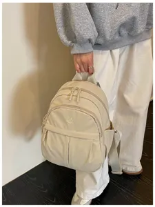 Lightweight nylon mini backpack for women, simple casual daily commuter school bag and purse.