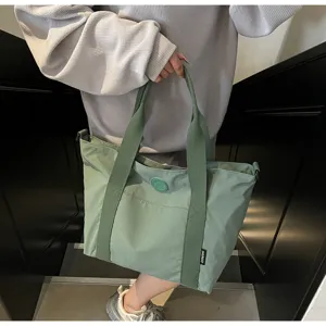 Groene casual grote canvas tote bag voor dames, stijlvolle minimalistische schoudertas.