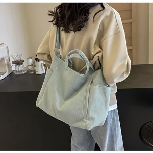 Casual corduroy tote bag for women, large capacity shoulder handbag and stylish commuting bags.