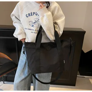 Grote zwarte canvas shopper, veelzijdige retro woon-werk schouder- en crossbodytas voor dames.