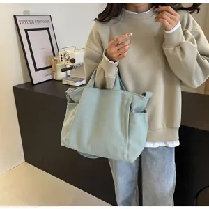 Stylish large capacity corduroy tote bag for women, versatile shoulder handbag for daily work.
