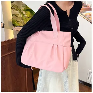 Large capacity nylon tote bag for women, casual shoulder handbag, stylish commuting bag.