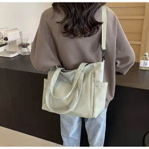 Waterproof nylon tote bag for women, large capacity casual crossbody shoulder bag with multi pockets.