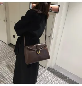 Minimalist brown leather shoulder bag, soft envelope crossbody bag for women, niche design.