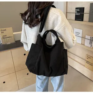 Black corduroy tote bag for women large capacity shoulder handbag casual daily commute student bag.