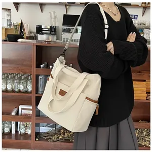 Detailed lifestyle shot of a spacious corduroy tote bag in beige, showcasing casual daily wear.