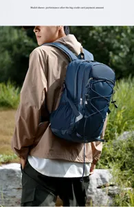 Outdoor mens large capacity backpack with bungee cords, hiking and travel gear detail view.