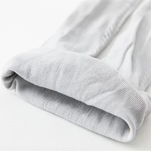 Collant a costine per bambini grigio trama a maglia fine primo piano immagine principale