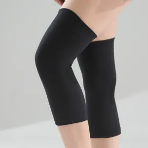Black elastic sports knee sleeves for men and women, breathable thermal warm knee support braces.