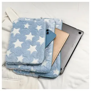 Plush star pattern laptop sleeve detail, soft fuzzy texture, cute tablet storage bag design.