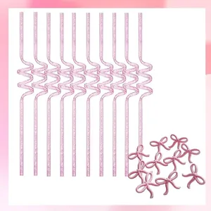 Pink glitter spiral party straws with cute bow decorations for birthdays and bar events.