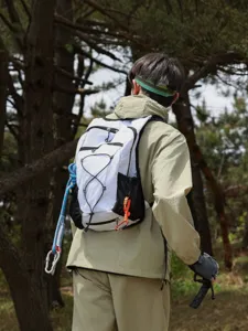 Outdoor cross-country running backpack with white and black design for hiking and sports