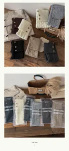 Cozy knit leg warmers for women, thick autumn winter boot cuffs with vintage button design.