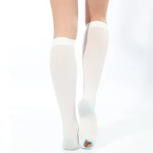 White open toe compression socks knee high anti embolism anti slip nursing stockings detail.
