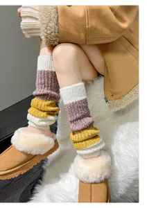 Cozy knit leg warmers for women, winter warm colorful striped calf stacking socks detail.