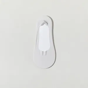 White no-show socks for women, thin shallow-cut cream style, comfortable single-piece design.