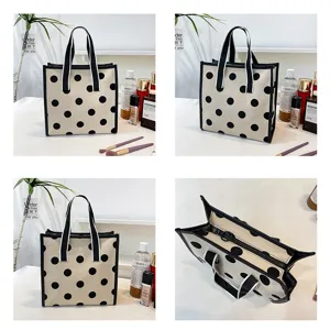 Large capacity polka dot cosmetic bag portable toiletry organizer travel storage pouch.