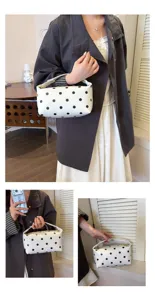White PU leather cosmetic bag with black polka dots, minimalist portable handbag for travel.