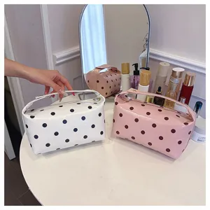Portable PU leather polka dot cosmetic bag daily wash and makeup storage bag detail showcase.