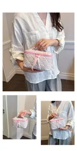 Detailed view of the quilted floral cotton cosmetic bag showing its fine craftsmanship and zipper.