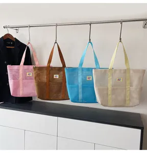 Large mesh tote bag casual shoulder travel bag cosmetic bag portable handbag set of 4 colors.