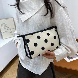 Large capacity polka dot canvas cosmetic bag, portable travel makeup storage toiletry pouch.