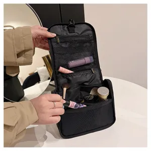 Black hanging toiletry bag large capacity travel cosmetic organizer with multiple mesh pockets for women