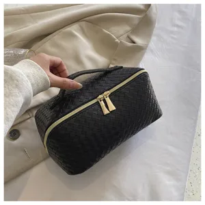 Zwarte geweven cosmetische tas met dubbele rits, stijlvolle draagbare make-up opbergtas.