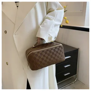 Brown checkered cosmetic bag, large capacity travel toiletry organizer with zipper handle.
